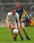 3 May 2014; Nichole Kelly, Antrim, in action against Laura Fleming, Roscommon. TESCO Ladies National Football League Division 4 Final, Antrim v Roscommon, O'Connor Park, Tullamore, Co. Offaly. Picture credit: Ray McManus / SPORTSFILE