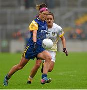 3 May 2014; Amanda McLoone, Roscommon, in action against Rachael Fulton, Antrim. TESCO Ladies National Football League Division 4 Final, Antrim v Roscommon, O'Connor Park, Tullamore, Co. Offaly. Picture credit: Ray McManus / SPORTSFILE
