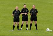 25 May 2014; Referee Joe McQuillan, centre, standby referee Marty Duffy, left, and  linesman Ciaran Branagan during the National Anthem. Ulster GAA Football Senior Championship Quarter-Final, Derry v Donegal, Celtic Park, Derry. Picture credit: Oliver McVeigh / SPORTSFILE