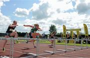 31 May 2014; Molly Scott, 3, Scoil Chonglais, Baltinglass, Co. Wicklow, on her way to winning the Inter Girls 80m Hurdles event from Clodagh O'Mahoney, Laurel Hill Coláiste, Co. Limerick. The Aviva All-Ireland Schools Track and Field Championships. Tullamore Harriers, Tullamore, Co. Offaly. Picture credit: Tomás Greally / SPORTSFILE