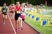 31 May 2014; Emma Hutchinson, Ballyclare High School, Co. Antrim, on her way to winning the Junior Girls 1500m event, ahead of Nicola Duffy, St. Peters Dunboyne, Co. Meath. The Aviva All-Ireland Schools Track and Field Championships. Tullamore Harriers, Tullamore, Co. Offaly. Picture credit: Tomás Greally / SPORTSFILE