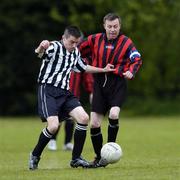 29 April 2006; Peter Battersby, Prosper Fingal, in action against John Cousins, Cheeverstown House, Special Olympics Festival of Football Cup Semi Final, Cheeverstown House v Prosper Fingal, AUL Clonshaugh, Dublin. Picture credit: Damien Eagers / SPORTSFILE