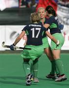 1 May 2006; Catriona Carey, centre, Ireland, is congratulated by team-mates Eimear Cregan, right, and Nikki Symmons (17) after scoring the winning goal against Italy with 12 seconds left on the clock. Samsung Women's Hockey World Cup Qualifier, Ireland v Italy, Rome, Italy. Picture credit: SPORTSFILE