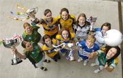 3 May 2006; Footballers, left to right, Gillian Bennett, Meath, Louise McKeever, Meath, Helen Quinn, Clare, Lorranie Kelly, Clare, Louise Henchy, Clare, Irene Munnelly, Meath, Martina Dunne, Laois,Kate Leahy, Kildare, Anita Newell, Monaghan and Lorraine Brennan, Leitrim, at a photocall in advance of the Suzuki Ladies National Football League Finals. The Division 1 Final, Cork v Meath, and the Division 2 Final, Kildare v Laois will take place on Saturday May 6th in Parnell Park, Dublin. The Divison 3 Finals, featuring Clare v Leitrim and Monaghan v Galway, are to be played on Sunday May 7th in Pairc Chiarain, Athlone, Co. Westmeath. Croke Park Dublin. Picture credit: David Maher / SPORTSFILE