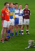 3 May 2006; ‘Immortality Beckons’ for the winner of the Liam MacCarthy Cup. Pictured officially launching the 2006 Guinness All-Ireland Senior Hurling Championship, are captains, from left, Pat Mulcahy, Cork, Sean McMahon, Clare, Ger O'Grady, Tipperary, Brendan Murphy, Offaly, Paul Flynn, Waterford, Patrick Mullaney, Laois and Liam Donoghue, Galway. This year’s Guinness advertising campaign for the Hurling Championship focuses on how winning the Liam MacCarthy Cup will immortalise the team in Irish sporting history, alongside all the previous winners. Picture credit: David Levingstone / SPORTSFILE