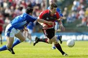 7 May 2006; Ronan Murtagh, Down, is tackled by Paul Brady, Cavan. Bank of Ireland Ulster Football Championship, Preliminary Round, Down v Cavan, Casement Park, Belfast, Co Antrim. Picture credit; Aoife Rice / SPORTSFILE