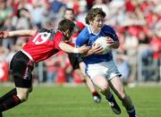 7 May 2006; Anthony Gaynor, Cavan, is tackled by Ronan Murtagh, Down. Bank of Ireland Ulster Football Championship, Preliminary Round, Down v Cavan, Casement Park, Belfast, Co Antrim. Picture credit; Oliver McVeigh / SPORTSFILE