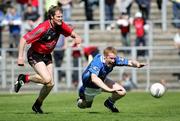 7 May 2006; Dermot McCabe, Cavan, is tackled by Alan Molloy, Down. Bank of Ireland Ulster Football Championship, Preliminary Round, Down v Cavan, Casement Park, Belfast, Co Antrim. Picture credit; Oliver McVeigh / SPORTSFILE