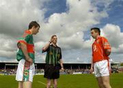 7 May 2006; Referee Joe McQuillan tosses the coin in front of Mayo captain Keith Higgins, left, and Cork captain Paul Kerrigan, right. Cadbury's All-Ireland U21 Football Final, Cork v Mayo, Cusack Park, Ennis, Co. Clare. Picture credit; Pat Murphy / SPORTSFILE