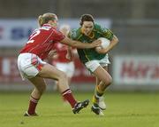 6 May 2006; Katie O'Brien, Meath, in action against Brid Stack, Cork. Suzuki Ladies National Football League, Division 1 Final, Cork v Meath, Parnell Park, Dublin. Picture credit: Brendan Moran / SPORTSFILE