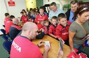 11 May 2006; Munster players sign autographs for fans after a squad training session. Thomond Park, Limerick. Picture credit: Kieran Clancy / SPORTSFILE