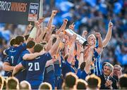31 May 2014; The Leinster team celebrate as captain Leo Cullen lifts the trophy watched by members of the Glasgow squad. Celtic League 2013/14 Grand Final, Leinster v Glasgow Warriors, RDS, Ballsbridge, Dublin. Picture credit: Brendan Moran / SPORTSFILE