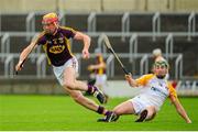 1 June 2014; Andrew Shore, Wexford, in action against Paul Shiels, Antrim. Leinster GAA Hurling Senior Championship, Quarter-Final, Wexford v Antrim, O'Moore Park, Portlaoise, Co. Laois. Picture credit: Tomás Greally / SPORTSFILE