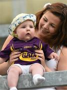 1 June 2014; Wexford supporters 6 monthe old Bonnie Ryan-Roche and her mother Eadaoin Ryan from Oulart the Ballagh, Co. Wexford. Leinster GAA Hurling Senior Championship, Quarter-Final, Wexford v Antrim, O'Moore Park, Portlaoise, Co. Laois. Picture credit: Matt Browne / SPORTSFILE
