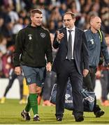 31 May 2014;  Republic of Ireland manager Martin O'Neill with assistant manager Roy Keane at the end of the game. International Friendly, Republic of Ireland v Italy, Craven Cottage, Fulham, London, England. Picture credit: David Maher / SPORTSFILE