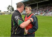 1 June 2014; Antrim manager Kevin Ryan speaks with referee Alan Kelly after the game. Leinster GAA Hurling Senior Championship, Quarter-Final, Wexford v Antrim, O'Moore Park, Portlaoise, Co. Laois. Picture credit: Matt Browne / SPORTSFILE