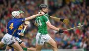 1 June 2014; Kevin Downes, Limerick, in action against Michael Cahill, Tipperary. Munster GAA Hurling Senior Championship, Semi-Final, Tipperary v Limerick, Semple Stadium, Thurles, Co. Tipperary. Picture credit: Ray McManus / SPORTSFILE