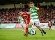 1 June 2014; Shane Robinson, Shamrock Rovers, in action against John Russell, Sligo Rovers. SSE Airtricity League Premier Division, Sligo Rovers v Shamrock Rovers, The Showgrounds, Sligo. Picture credit: Ramsey Cardy / SPORTSFILE