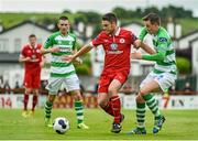 1 June 2014; John Russell, Sligo Rovers, in action against Ronan Finn, Shamrock Rovers. SSE Airtricity League Premier Division, Sligo Rovers v Shamrock Rovers, The Showgrounds, Sligo. Picture credit: Ramsey Cardy / SPORTSFILE