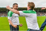 1 June 2014; Limerick manager TJ Ryan and selector Paul Beary celebrate at the final whistle. Munster GAA Hurling Senior Championship, Semi-Final, Tipperary v Limerick, Semple Stadium, Thurles, Co. Tipperary. Picture credit: Diarmuid Greene / SPORTSFILE