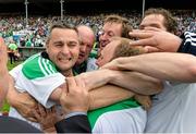 1 June 2014; Limerick manager TJ Ryan, left, celebrates with his management team after the game. Munster GAA Hurling Senior Championship, Semi-Final, Tipperary v Limerick, Semple Stadium, Thurles, Co. Tipperary. Picture credit: Diarmuid Greene / SPORTSFILE