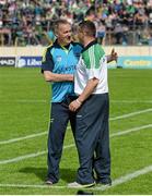 1 June 2014; Tipperary manager Eamon O'Shea and Limerick manager TJ Ryan exchange a handshake before the game. Munster GAA Hurling Senior Championship, Semi-Final, Tipperary v Limerick, Semple Stadium, Thurles, Co. Tipperary. Picture credit: Diarmuid Greene / SPORTSFILE