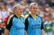 1 June 2014; Eamon O'Shea and Michael Ryan, Tipperary, stand during a moments silence before the game. Munster GAA Hurling Senior Championship, Semi-Final, Tipperary v Limerick, Semple Stadium, Thurles, Co. Tipperary. Picture credit: Ray McManus / SPORTSFILE