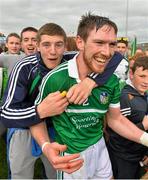 1 June 2014; Limerick's Seamus Hickey is congratulated after the game by Limerick supporter Brian Fanning, from Pallasgreen, Co. Limerick. Munster GAA Hurling Senior Championship, Semi-Final, Tipperary v Limerick, Semple Stadium, Thurles, Co. Tipperary. Picture credit: Diarmuid Greene / SPORTSFILE