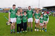 1 June 2014; Limerick players Declan Hannon and Tom Condon with supporters Sean Hayes, Rachel Hayes, Taghg Ryan, Sinéad, Sam and Jack McElligott, from Cappamaore and Caherline, after the game. Munster GAA Hurling Senior Championship, Semi-Final, Tipperary v Limerick, Semple Stadium, Thurles, Co. Tipperary. Picture credit: Ray McManus / SPORTSFILE