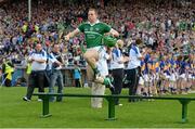 1 June 2014; Shane Dowling, Limerick, makes his way out for the team photograph before the game. Munster GAA Hurling Senior Championship, Semi-Final, Tipperary v Limerick, Semple Stadium, Thurles, Co. Tipperary. Picture credit: Diarmuid Greene / SPORTSFILE