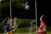 11 May 2006; The National Camogie League Division 1 Final between Cork and Tipperary takes place immediately following the Munster Hurling Championship clash between Limerick and Tipperary in Semple Stadium on Sunday next. Pictured at a photocall ahead of Sunday's game are Julie Kirwan, left, Tipperary, and Rena Buckley, Cork. Picture credit: David Maher / SPORTSFILE