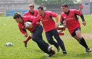 12 May 2006; Donncha O'Callaghan, Ronan O'Gara, Trevor Halstead and Denis Leamy in action during Munster squad training ahead of the Heineken Cup Final. Munster Squad Training, Thomond Park, Limerick. Picture credit; Kieran Clancy / SPORTSFILE