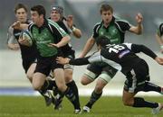 12 May 2006; Gavin Williams, Connacht, evades the tackle of Gavin Henson, Ospreys. Celtic League, Connacht v Ospreys, Sportsground, Galway. Picture credit: Damien Eagers / SPORTSFILE