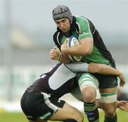 12 May 2006; John Muldoon, Connacht, is tackled by Barry Williams, Ospreys. Celtic League, Connacht v Ospreys, Sportsground, Galway. Picture credit: Damien Eagers / SPORTSFILE