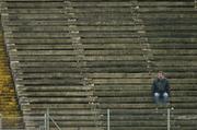 14 May 2006; A lone supporter watches the game. Guinness Ulster Senior Hurling Championship Semi-Final, Down v Antrim, Casement Park, Belfast. Picture credit; Pat Murphy / SPORTSFILE