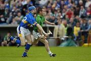 14 May 2006; Donie Ryan, Limerick, is tackled by Ken Dunne, Tipperary, Guinness Munster Senior Hurling Championship Quarter Final, Tipperary v Limerick, Semple Stadium, Thurles, Co. Tipperary. Picture credit; Ray McManus / SPORTSFILE