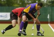 14 May 2006; Tim Lewis, Pembroke Wanderers, in action against Eugene Magee, Banbridge. The Men's 2006 Club Championships, Pembroke Wanderers v Banbridge, National Hockey Stadium, UCD, Belfield, Dublin. Picture credit: Ciara Lyster / SPORTSFILE