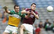 14 May 2006; Alan McNamee, Offaly, is tackled by David Duffy, Westmeath. Bank of Ireland Leinster Senior Football Championship, Round 1, Westmeath v Offaly, Croke Park, Dublin. Picture credit; David Maher / SPORTSFILE