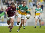 14 May 2006; Ciaran McManus, Offaly, is tackled by Alan Mangan, Westmeath. Bank of Ireland Leinster Senior Football Championship, Round 1, Westmeath v Offaly, Croke Park, Dublin. Picture credit; Brian Lawless / SPORTSFILE