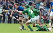 14 May 2006; John Carroll, Tipperary, in action against Mike Fitzgerald, Limerick. Guinness Munster Senior Hurling Championship Quarter Final, Tipperary v Limerick, Semple Stadium, Thurles, Co. Tipperary. Picture credit; David Levingstone / SPORTSFILE