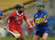14 May 2006; Una O'Donoghue, Cork, in action against Michelle Shortt, Tipperary. Camogie National League Division 1A Final, Cork v Tipperary, Semple Stadium, Thurles, Co. Tipperary. Picture credit; Ray McManus / SPORTSFILE