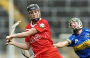14 May 2006; Angela Walsh, Cork, is tackled by Michelle Shortt, Tipperary. Camogie National League Division 1A Final, Cork v Tipperary, Semple Stadium, Thurles, Co. Tipperary. Picture credit; Ray McManus / SPORTSFILE