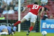 15 May 2006; Jason Byrne, Shelbourne, is fouled by Michael Devine, Cork City goalkeeper, which result in a converted penalty. eircom League, Premier Division, Cork City v Shelbourne, Turners Cross, Cork. Picture credit: David Maher / SPORTSFILE