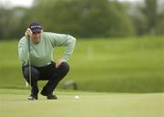16 May 2006; Padraig Harrington lines up a putt on the 2nd green. Nissan Irish Open Practice, Carton House Golf Club, Maynooth, Co. Kildare. Picture credit; Brian Lawless / SPORTSFILE