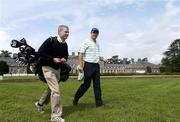 16 May 2006; Padraig Harrington makes his way to the practice range with his caddy Ronan Flood. Nissan Irish Open Practice, Carton House Golf Club, Maynooth, Co. Kildare. Picture credit; Brian Lawless / SPORTSFILE