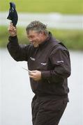 17 May 2006; Darren Clarke salutes his fellow players after finishing on the 18th during the Pro-Am competition. Nissan Irish Open Practice, Carton House Golf Club, Maynooth, Co. Kildare. Picture credit; Brian Lawless / SPORTSFILE