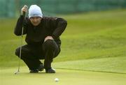 18 May 2006; Peter Lawrie, Ireland, lines up a putt on the 18th green during the first round. Nissan Irish Open Golf Championship, Carton House Golf Club, Maynooth, Co. Kildare. Picture credit; Brendan Moran / SPORTSFILE