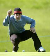18 May 2006; Paul McGinley, Ireland, lines up a putt on the 14th green during the first round. Nissan Irish Open Golf Championship, Carton House Golf Club, Maynooth, Co. Kildare. Picture credit; Brendan Moran / SPORTSFILE