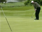 18 May 2006; Paul Casey, England, watches his putt on the 18th green during the first round. Nissan Irish Open Golf Championship, Carton House Golf Club, Maynooth, Co. Kildare. Picture credit; Brendan Moran / SPORTSFILE