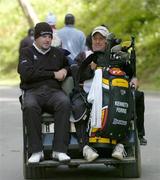 18 May 2006; Kenneth Ferrie, of England, is driven back to the clubhouse after first round play was suspended due to high winds. Nissan Irish Open Golf Championship, Carton House Golf Club, Maynooth, Co. Kildare. Picture credit; Brendan Moran / SPORTSFILE